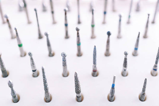 Vitality™ Oral Surgery Bur Selection Guide: Carbide vs. Diamond Explained